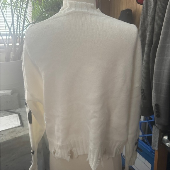 Unique Vintage White V-Neck Sweater with Black Crosses - Picture 8 of 8